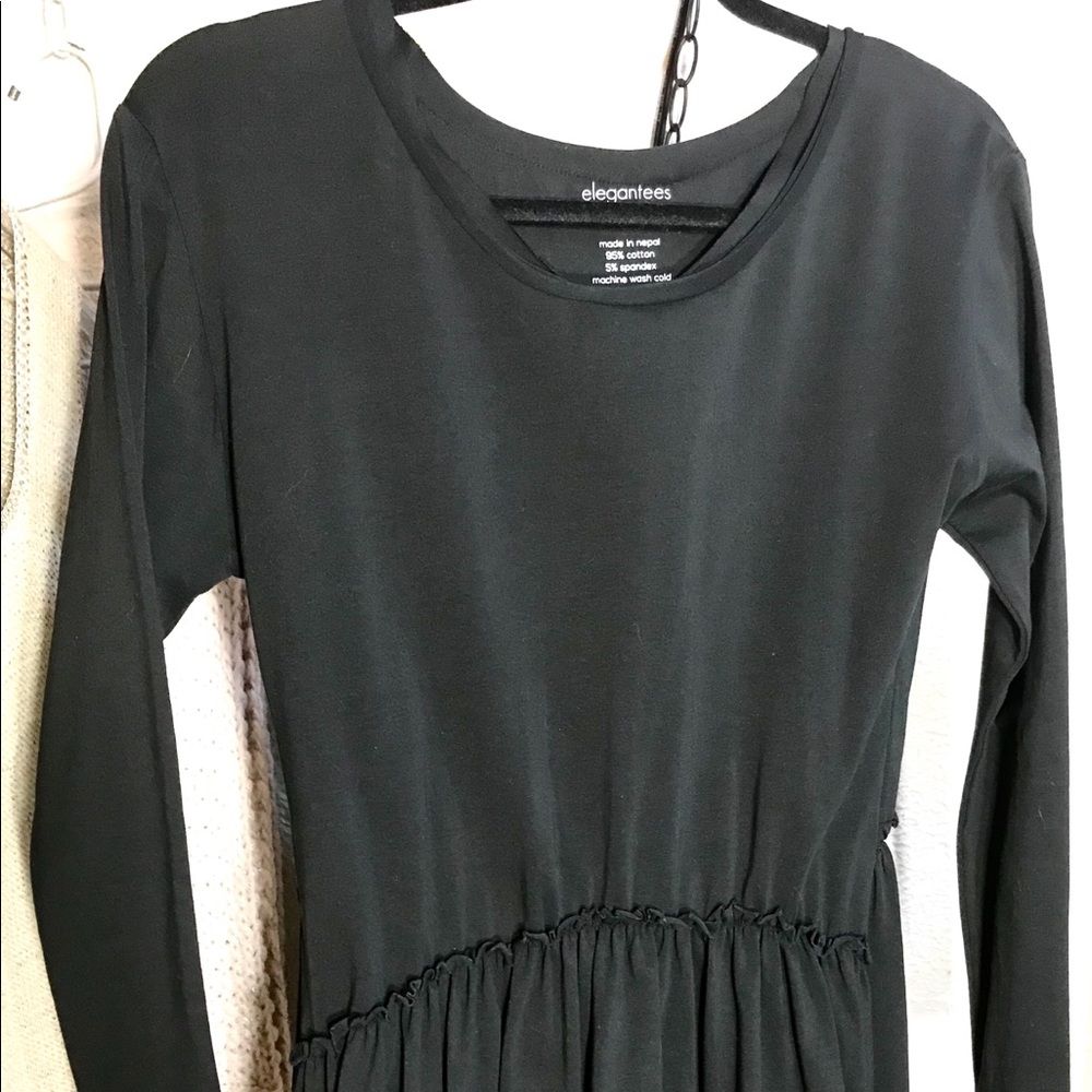 Black ruffle waste long sleeve top. Make offer